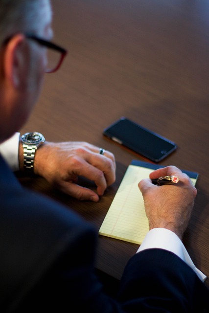 man with head in his hands in need of anxiety therapy